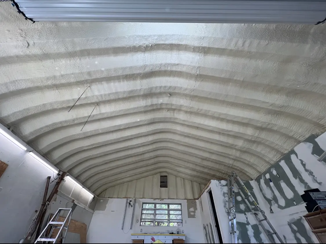 Spray polyurethane foam applied to the underside of a metal roof deck in Pleasant Valley